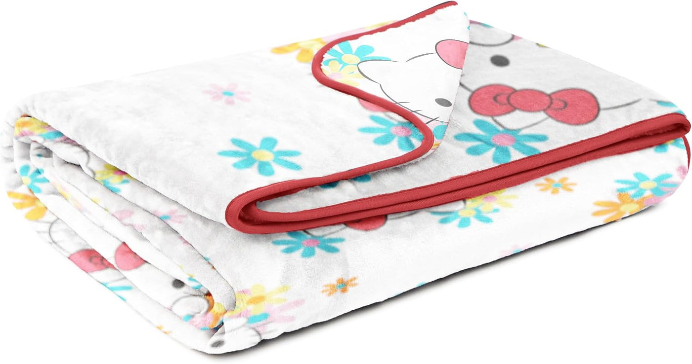 Hello Kitty - Manta de felpa de flores y gatitos, mide 60 x 90 pulg...