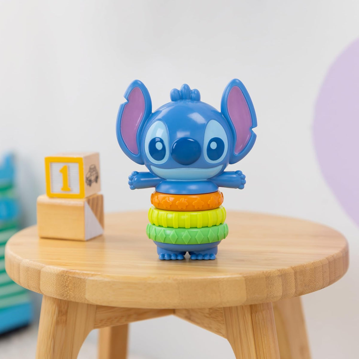 Bright Starts Disney Baby Stitch Twist-a-Stitch Juguete de dedo con...