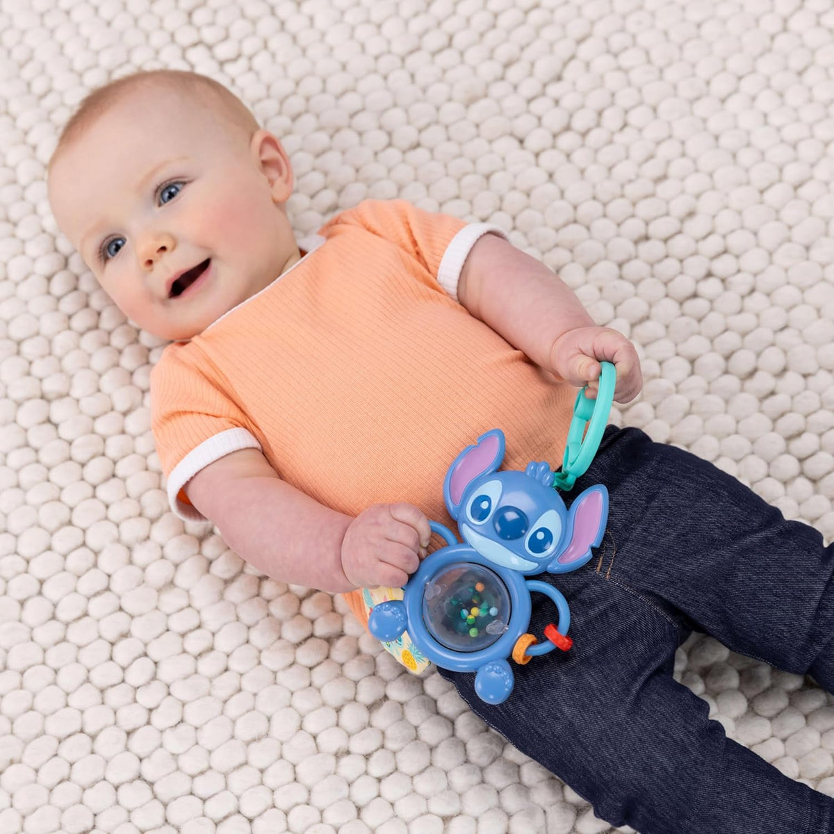 Bright Starts Disney Baby Stitch Tummy Tumble - Juguete giratorio p...
