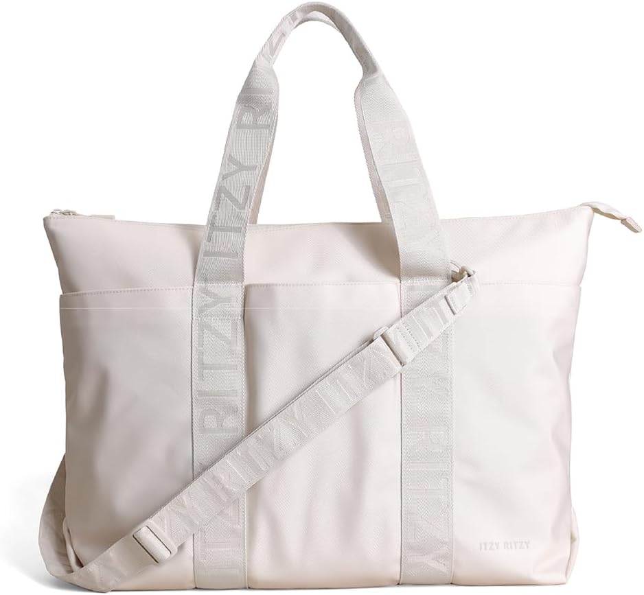 Itzy Ritzy Belong - Bolsa de pañales, bolsa ligera con 10 bolsillos...
