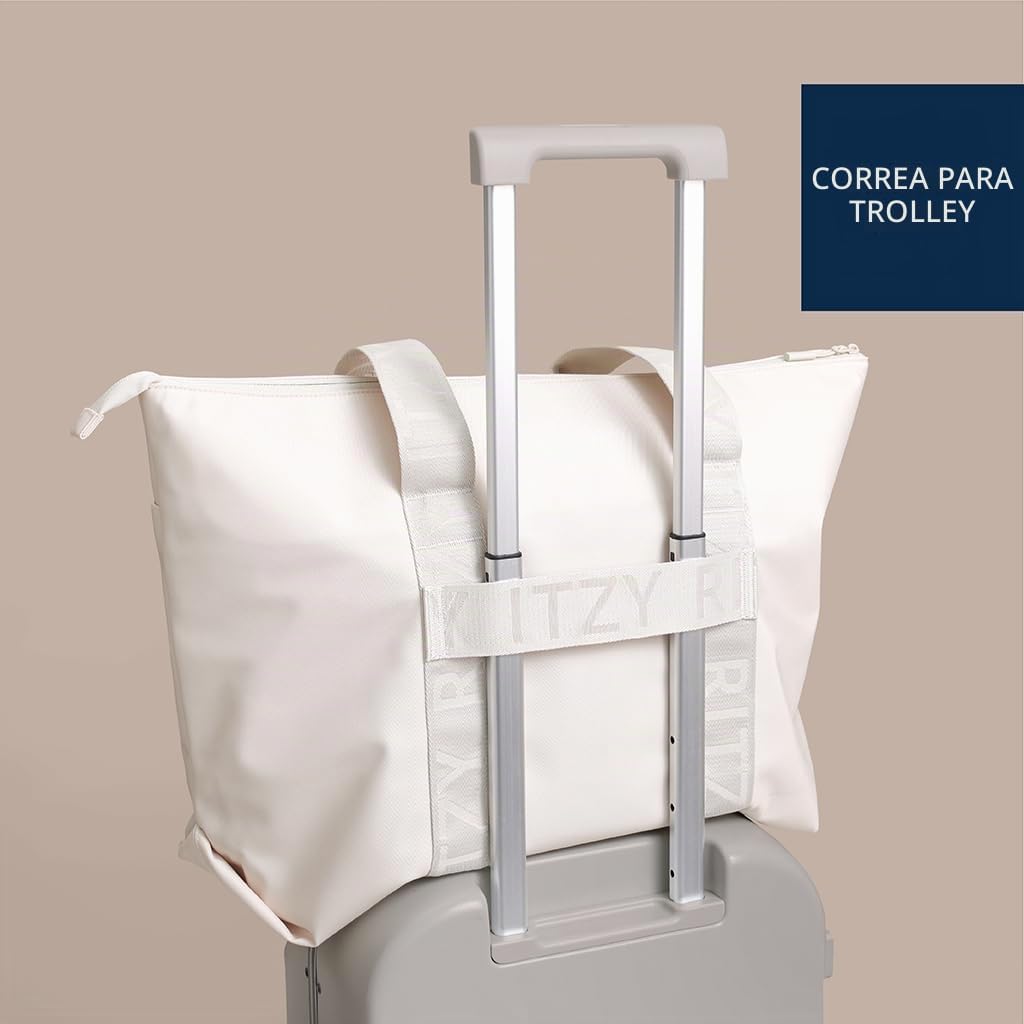 Itzy Ritzy Belong - Bolsa de pañales, bolsa ligera con 10 bolsillos...