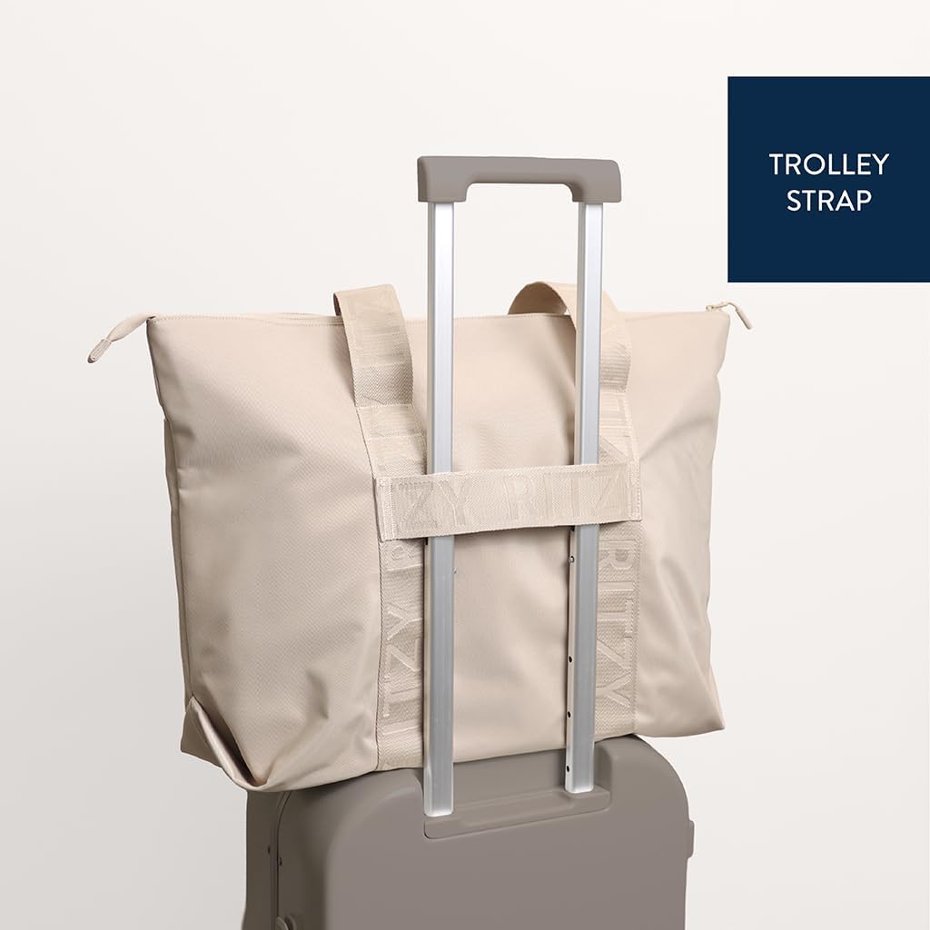 Itzy Ritzy Belong - Bolsa de pañales, bolsa ligera con 10 bolsillos...