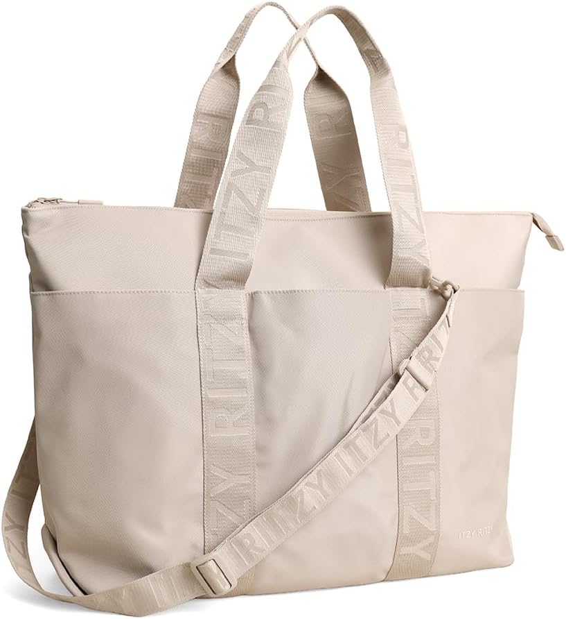 Itzy Ritzy Belong - Bolsa de pañales, bolsa ligera con 10 bolsillos...