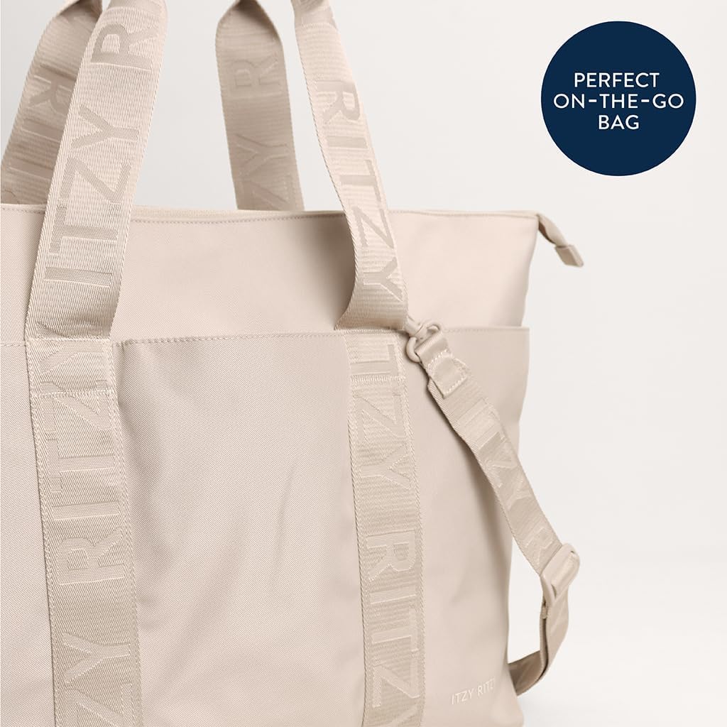 Itzy Ritzy Belong - Bolsa de pañales, bolsa ligera con 10 bolsillos...