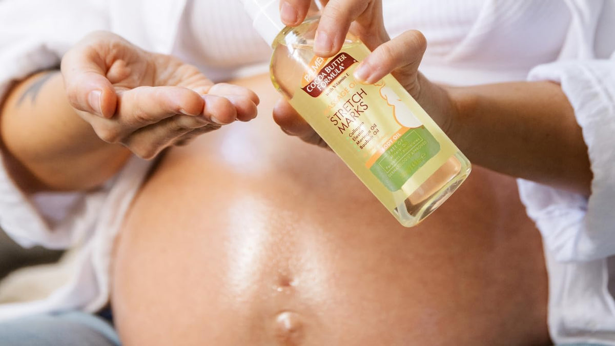 Palmer's Aceite de masaje con fórmula de manteca de cacao para...