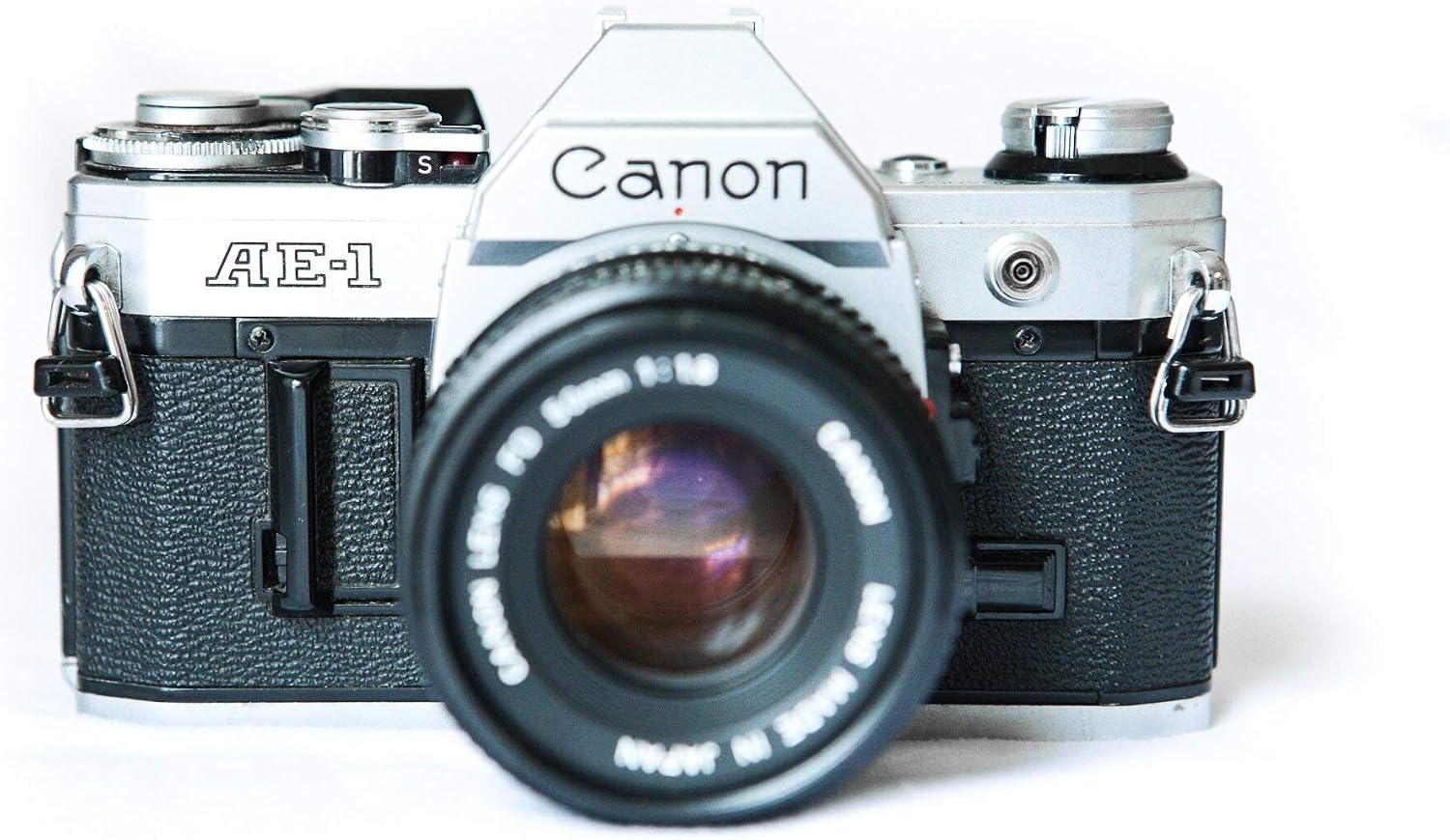 Canon Cámara de película AE-1 de 1.378 in con lente 1:1.8 de 1.969...