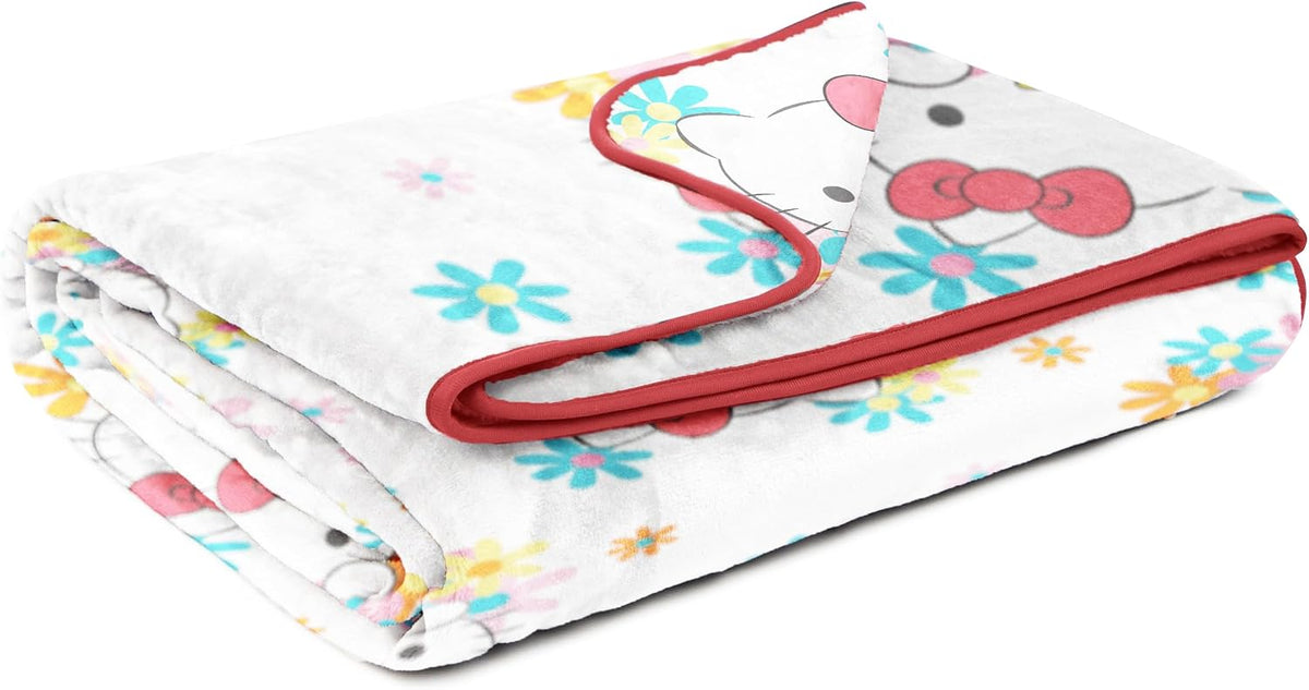 Hello Kitty - Manta de felpa de flores y gatitos, mide 60 x 90 pulg...