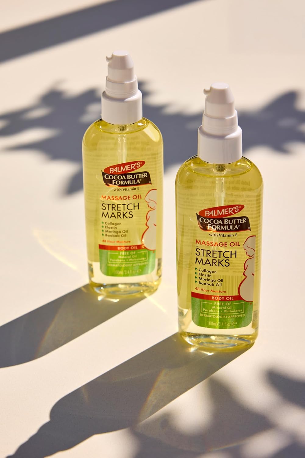 Palmer's Aceite de masaje con fórmula de manteca de cacao para...