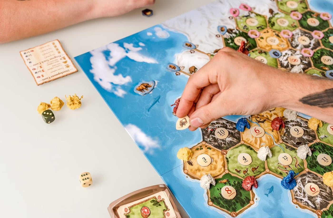 Catan: Amanecer de la Humanidad