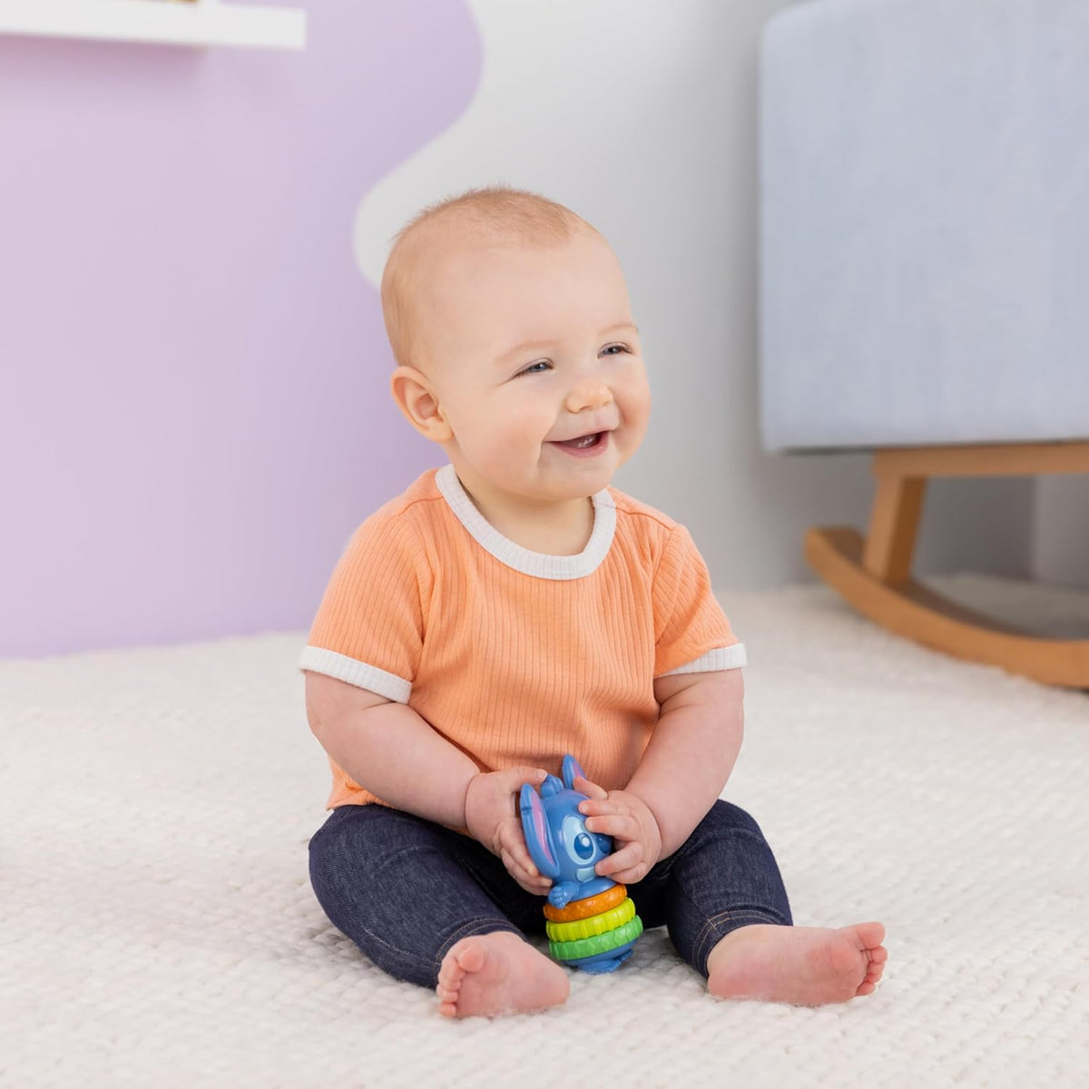 Bright Starts Disney Baby Stitch Twist-a-Stitch Juguete de dedo con...