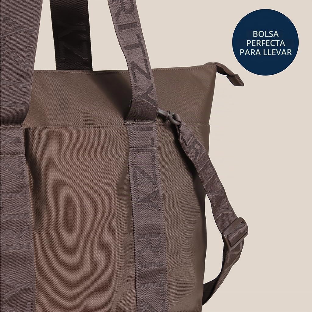 Itzy Ritzy Belong - Bolsa de pañales, bolsa ligera con 10 bolsillos...