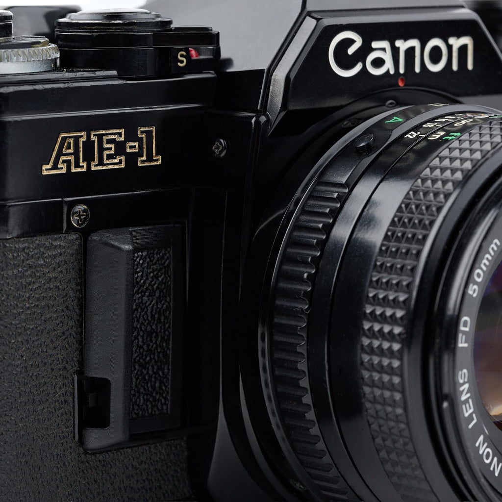 Cámara de película Canon AE-1 35 mm SRL con enfoque manual (negra)...