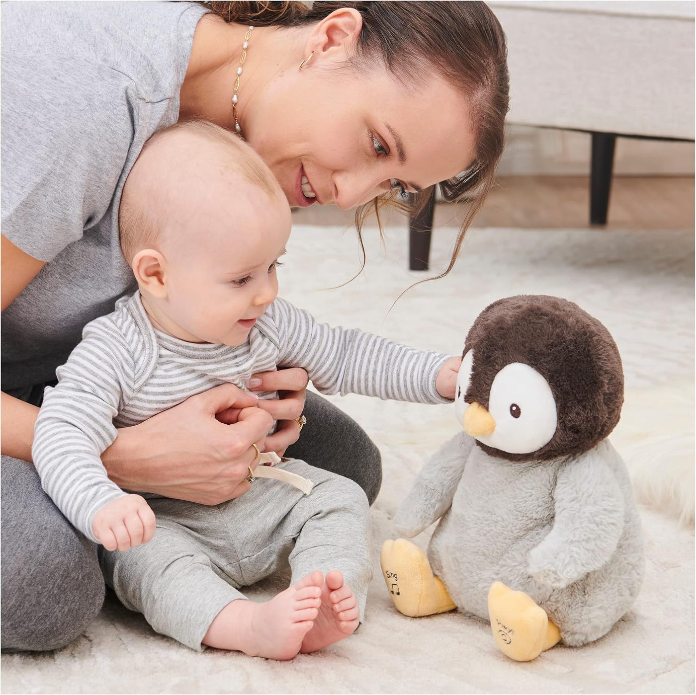 GUND Baby Kissy Penguin - Juguete musical musical interactivo de 12...