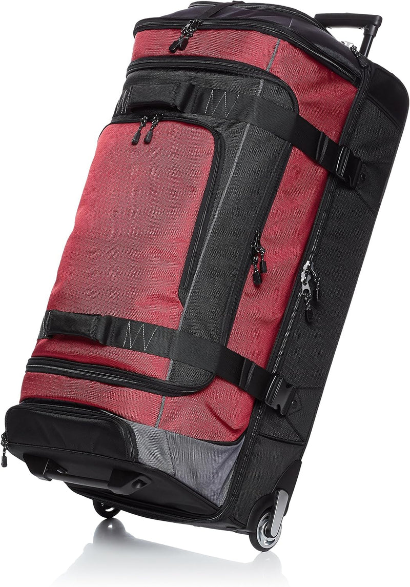 Amazon Basics - Bolsa de viaje con ruedas de Ripstop, Rojo